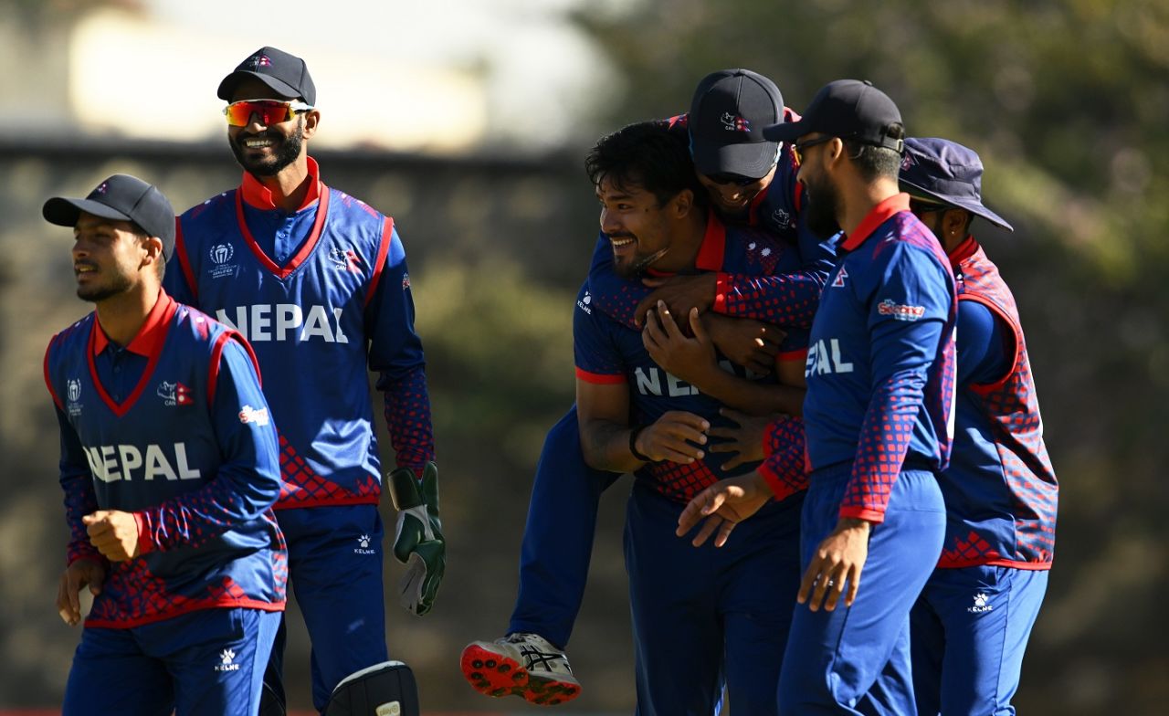 The Nepal fielders are all over Karan KC after he nabbed Steven Taylor lbw, Nepal vs USA, ICC World Cup Qualifier, Harare, June 20, 2023