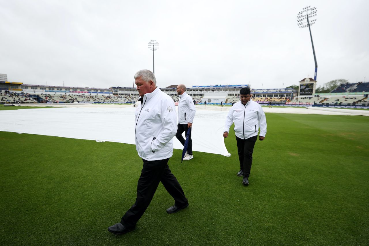 Marais Erasmus and Ahsan Raza inspect the ground after rain, England vs Australia, 1st Ashes Test, Edgbaston, 5th day, June 20, 2023
