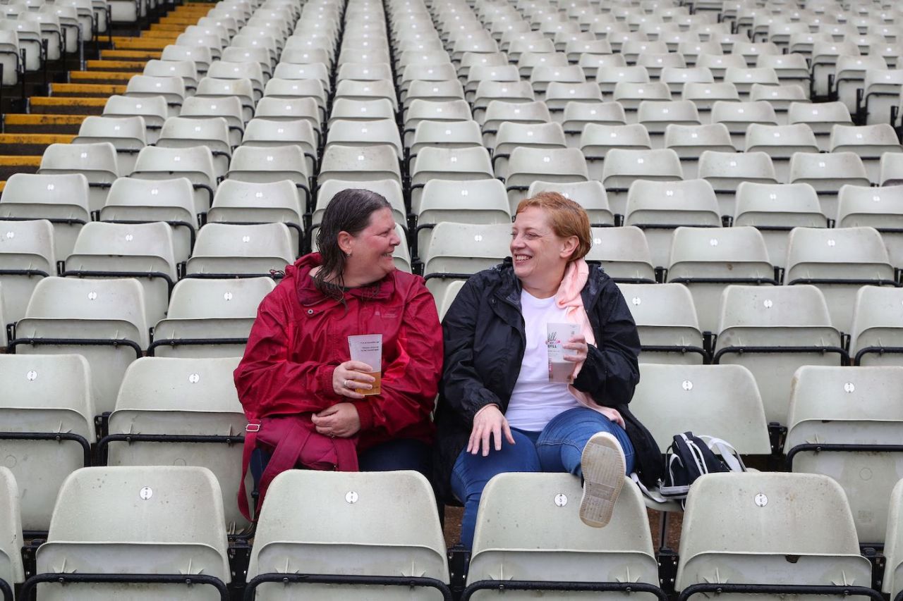 A couple of spectators chat away in the rain, England vs Australia, 1st Ashes Test, Edgbaston, 5th day, June 20, 2023