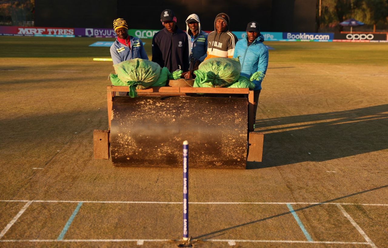 Members of the groundstaff use the roller on the pitch, Oman vs UAE, ICC Cricket World Cup Qualifier, Bulawayo, June 21, 2023
