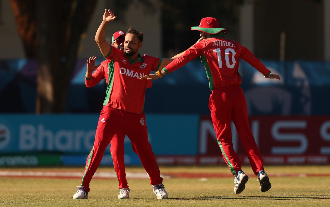 Fayyaz Butt is joined by a jubilant Jatinder Singh in celebrations, Oman vs UAE, ICC Cricket World Cup Qualifier, Bulawayo, June 21, 2023