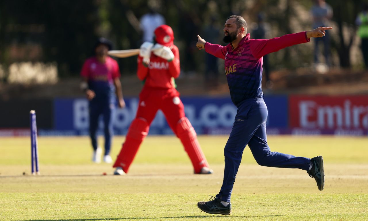 Rohan Mustafa celebrates after knocking over a set batter, Oman vs UAE, ICC Cricket World Cup Qualifier, Bulawayo, June 21, 2023
