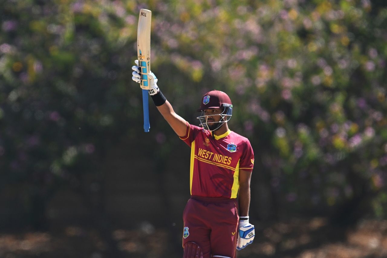 Nicholas Pooran raises his bat after reaching his half-century, Netherlands vs West Indies, ICC World Cup Qualifier, Harare, June 26, 2023