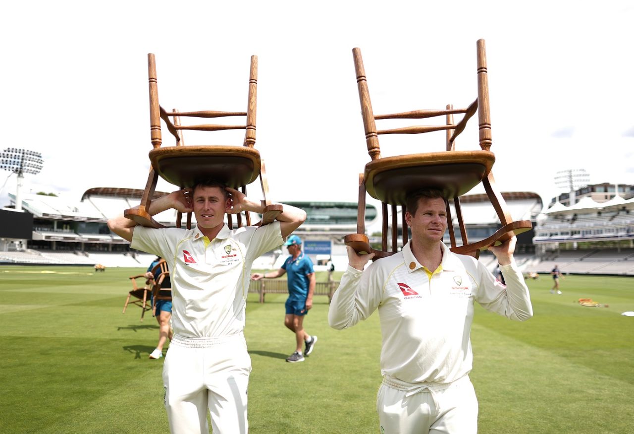 Marnus Labuschagne and Steven Smith carry the chairs after posing for a group picture , Ashes 2023, Lord's, June 26, 2023