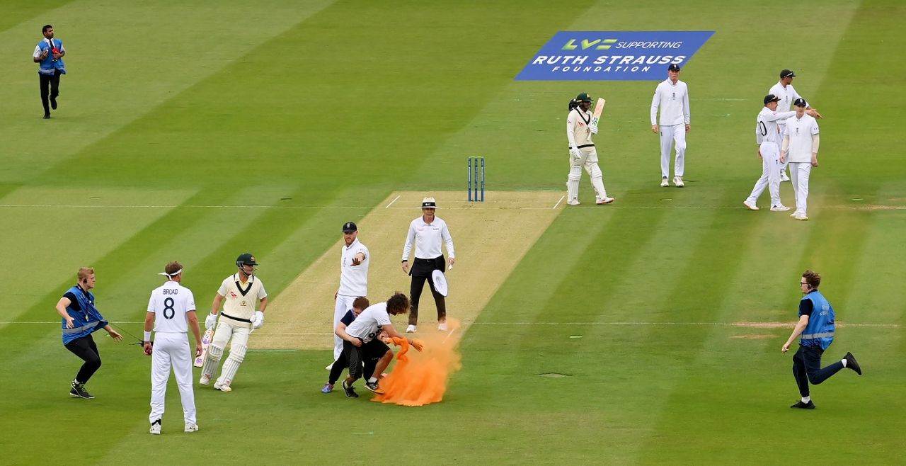 A security personnel tackles a 'Just Stop Oil' pitch invader, England vs Australia, 2nd Ashes Test, Lord's, 1st day, June 28, 2023