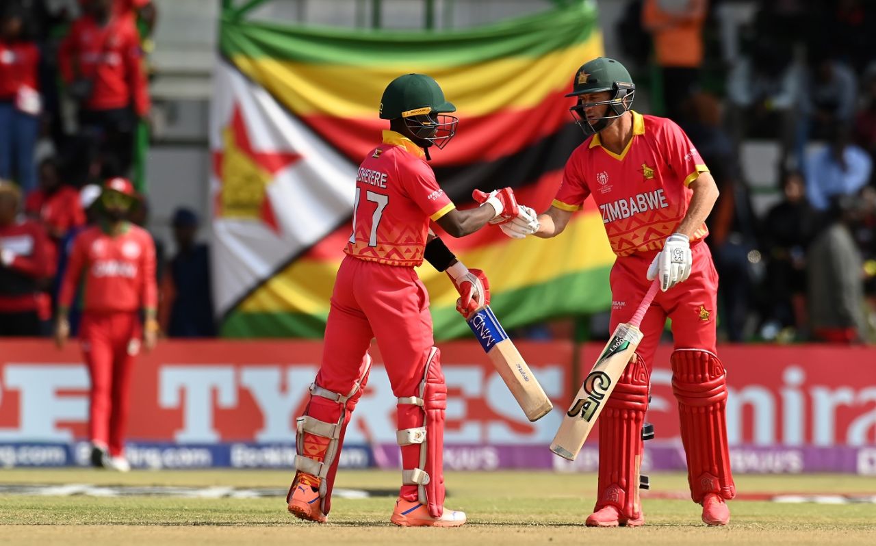 Sean Williams touches gloves with Wessly Madhevere, Oman vs Zimbabwe, The Super Sixes, World Cup Qualifiers, Bulawayo, June 29, 2023