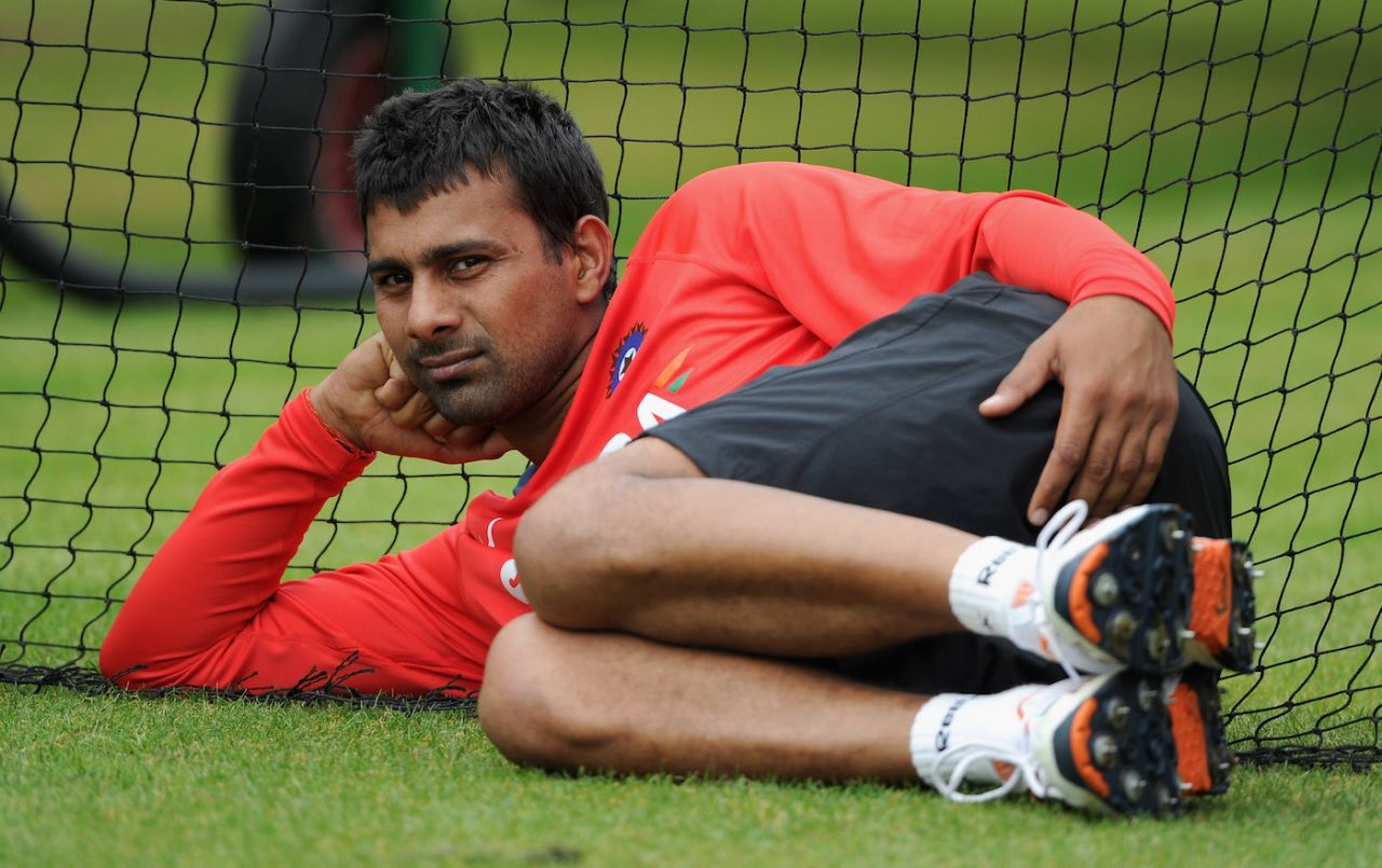 Praveen Kumar takes a break during a nets session, Manchester, August 30, 2011