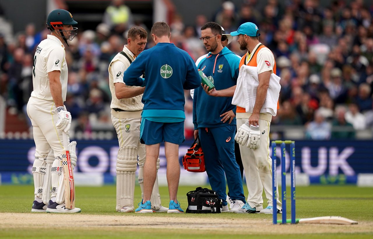 Marnus Labuschagne gets some treatment from the physio, England vs Australia, 4th Ashes Test, Old Trafford, 4th day, July 22, 2023