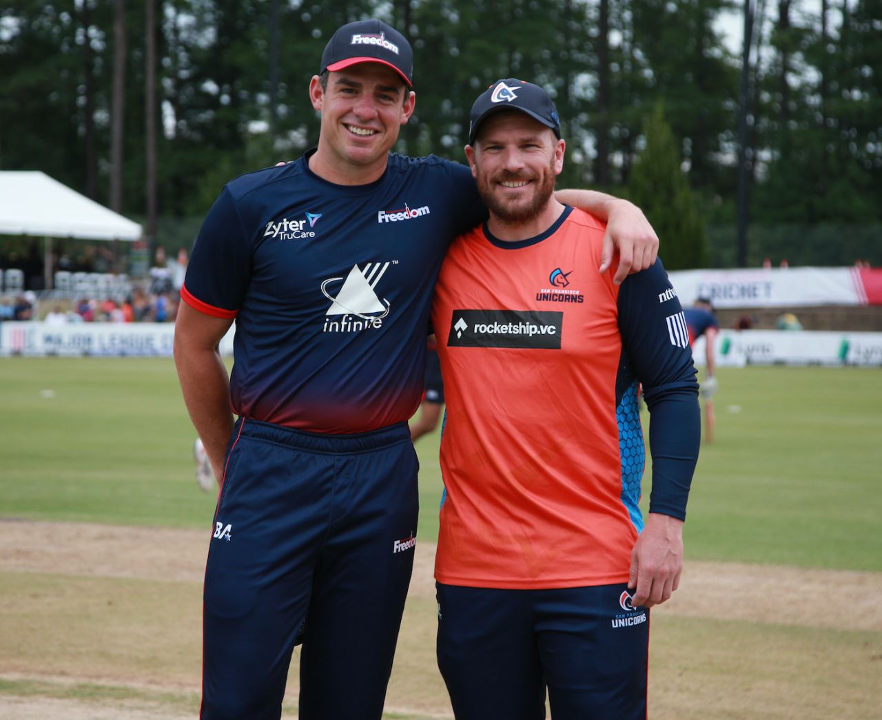 Moises Henriques and Aaron Finch, the two captains, pose after the toss