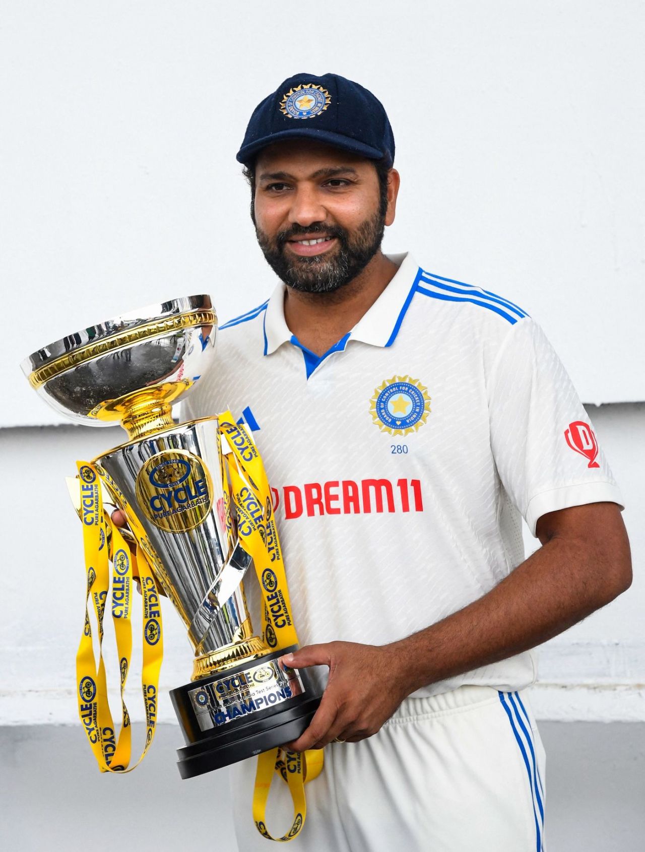 Rohit Sharma with the trophy after India won the series 1-0, West Indies vs India, 2nd men's Test, Trinidad, 5th day, July 24, 2023