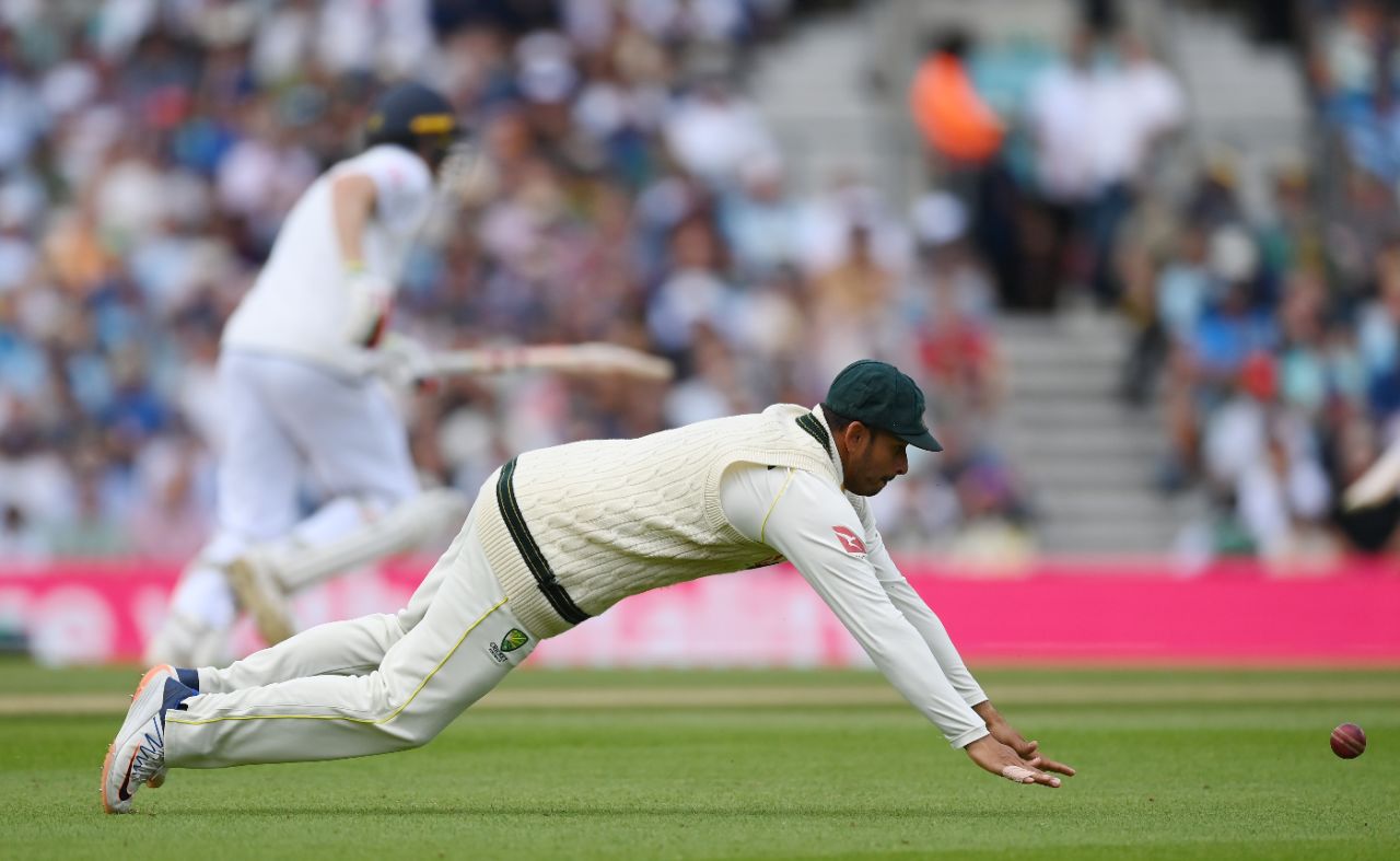Usman Khawaja dives for the ball as Zak Crawley runs another single, England vs Australia, 5th men's Ashes Test, The Oval, 3rd day, July 29, 2023