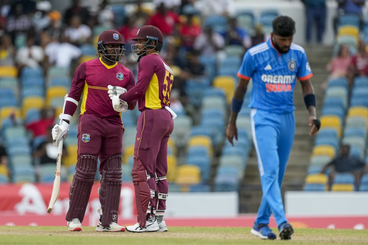 Kyle Mayers and Brandon King have a chat as Hardik Pandya walks back, West Indies vs India, 2nd ODI, Bridgetown, July 29, 2023
