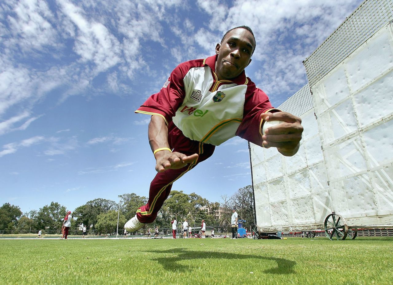Dwayne Bravo dives for a catch during a nets session, Junction Oval, Melbourne, January 3, 2005 