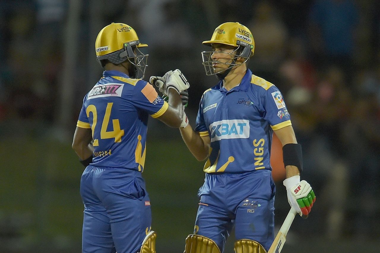 Nishan Madushka and Rahmanullah Gurbaz bump fists during their partnership, Colombo Strikers vs Jaffna Kings, Pallekele, Lanka Premier League, August 8, 2023