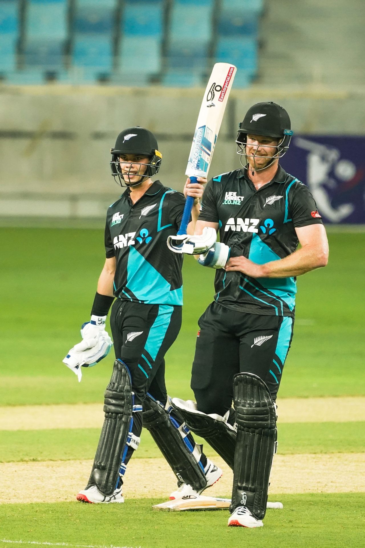 Mark Chapman raises his bat after a counter-punching fifty, UAE vs New Zealand, 2nd T20I, Dubai, August 19, 2023