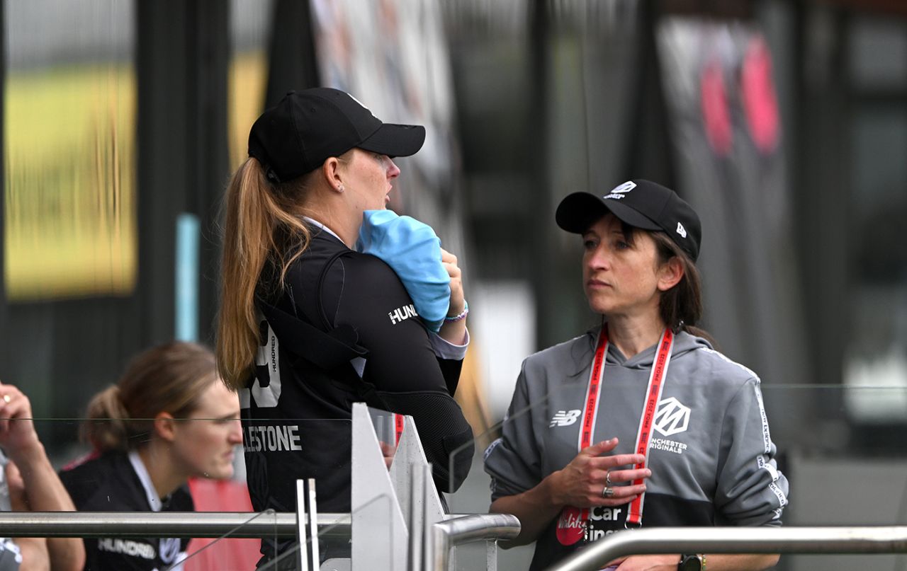 Sophie Ecclestone is treated for a shoulder injury suffered during the warm-ups, Manchester Originals vs Southern Brave, Women's Hundred, August 23, 2023