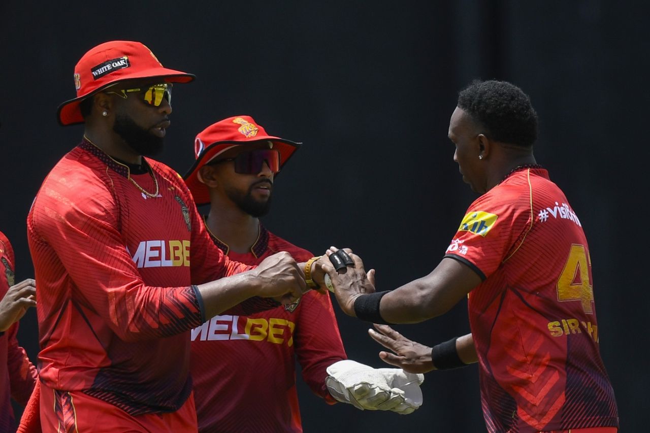 Dwayne Bravo is congratulated by Kieron Pollard and Nicholas Pooran, St Lucia Kings vs Trinbago Knight Riders, CPL 2023, Basseterre, August 26, 2023