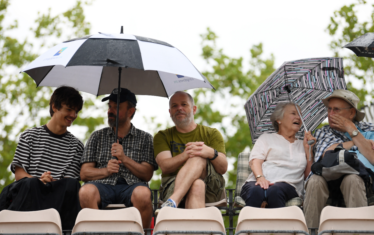 Spectators wait under umbrellas at the Ageas Bowl, England vs New Zealand, 2nd ODI, Ageas Bowl, September 10, 2023