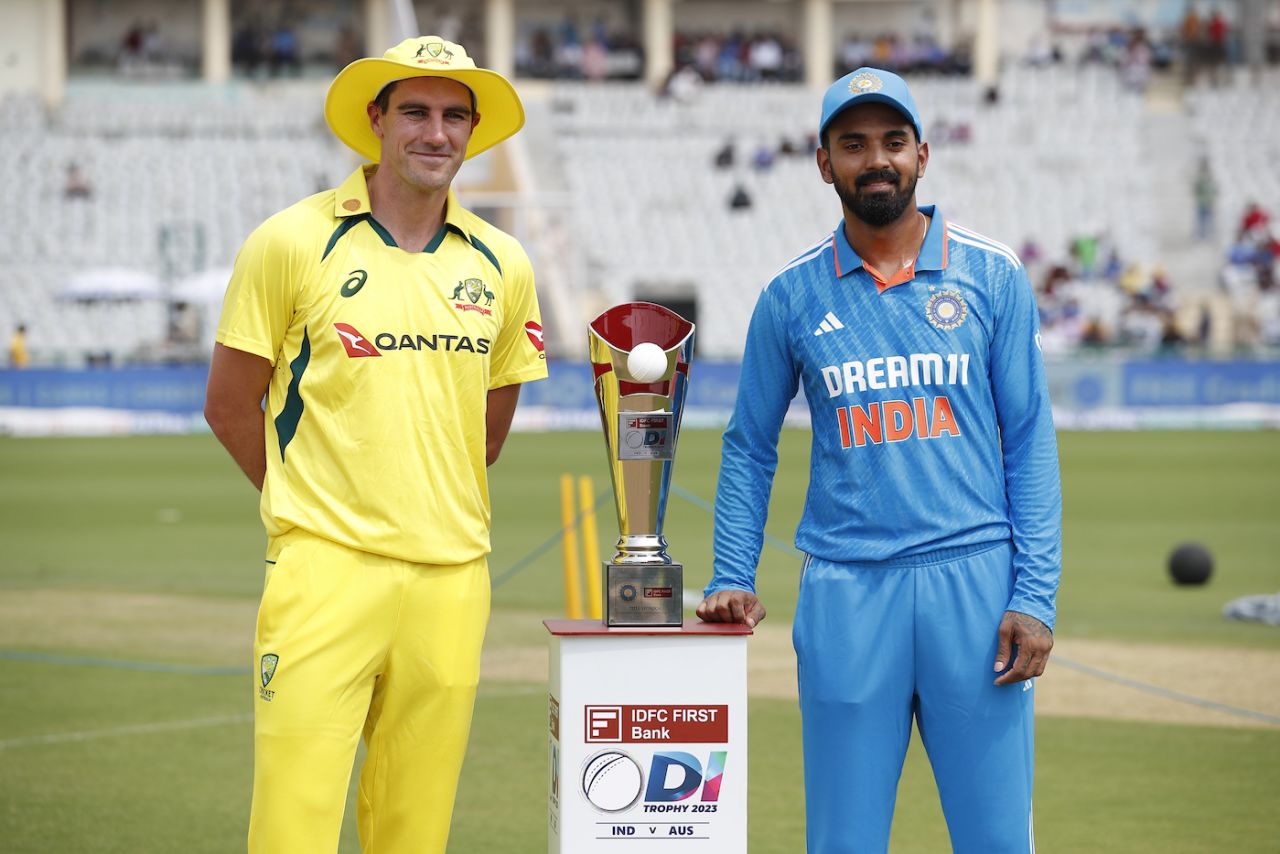 Pat Cummins, making a rare appearance as Australia ODI captain, and KL Rahul, standing in for Rohit Sharma, pose with the prize, India vs Australia, 1st ODI, Mohali, September 21, 2023