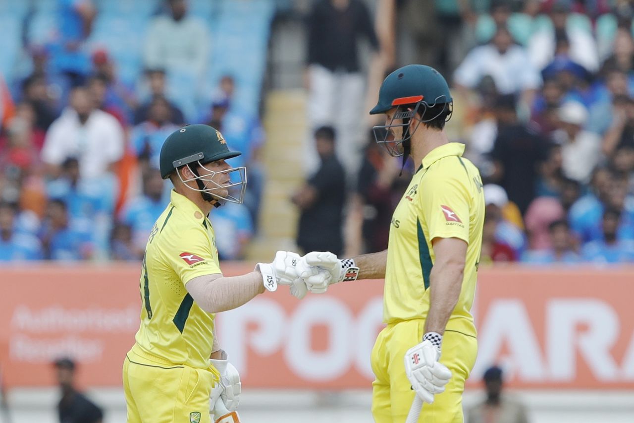 David Warner and Mitchell Marsh show some glove-love after giving Australia a rollicking start, India vs Australia, 3rd ODI, Rajkot, September 27, 2023