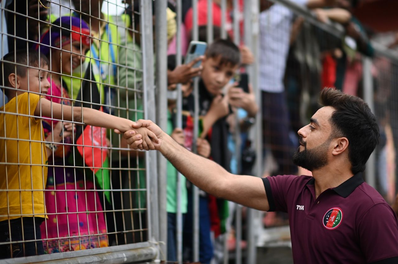 Rashid Khan greets a fan, Afghanistan vs South Africa, warm-up, Thiruvananthapuram, World Cup 2023, September 29, 2023