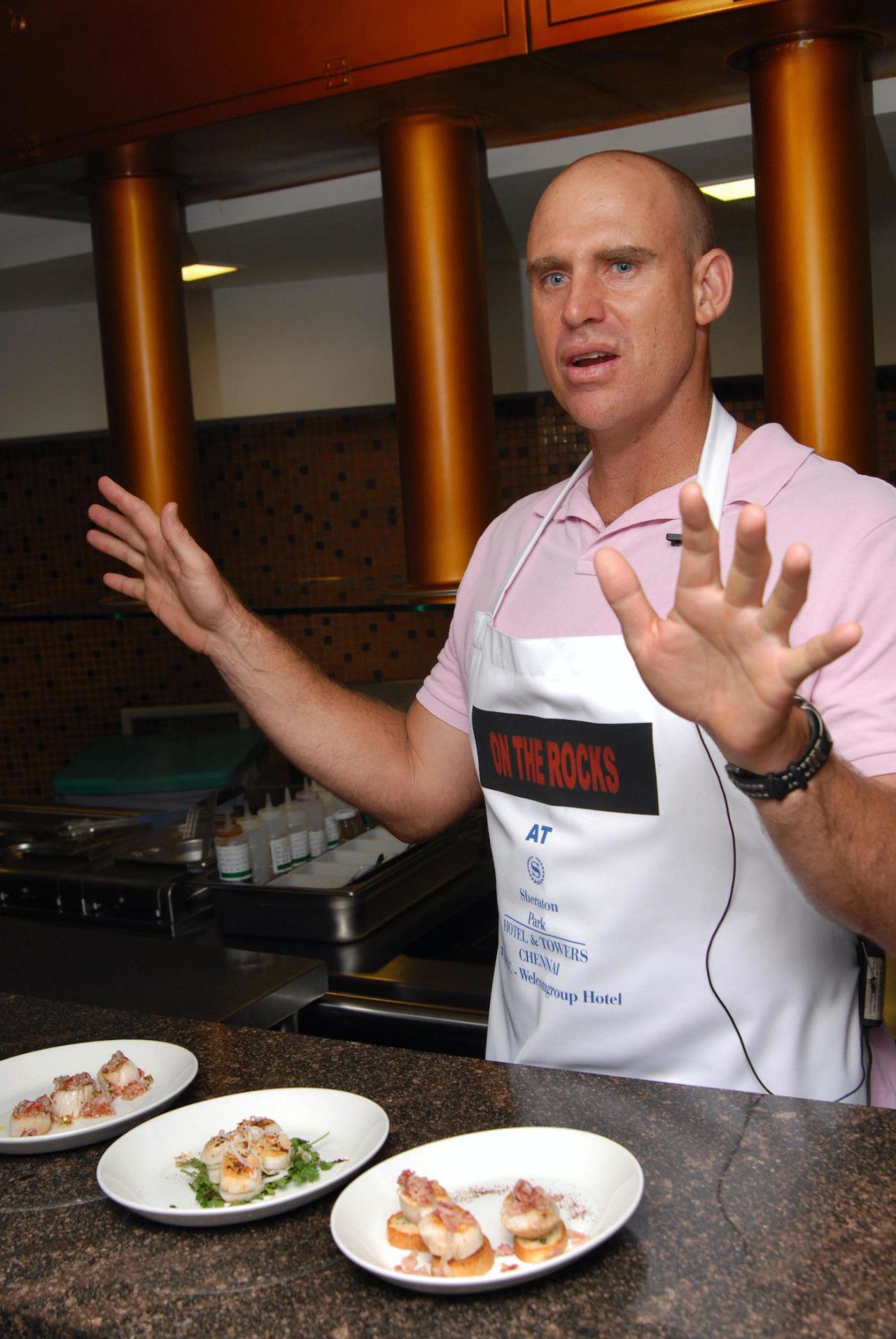 Matthew Hayden demonstrates his cooking skills during the inauguration of the On the Rocks restaurant at the Sheraton, Chennai on April 7, 2009