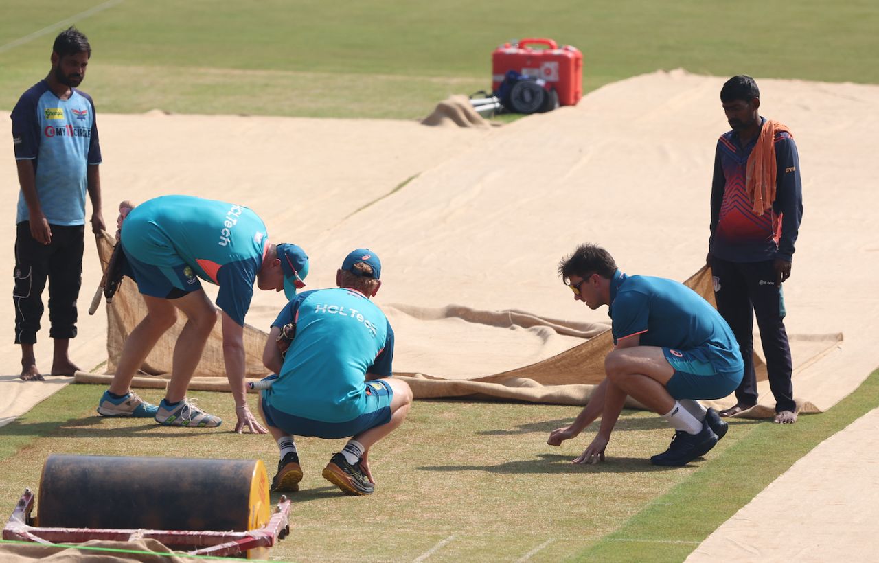 Pat Cummins takes a look at the pitch in Lucknow on the eve of Australia's ODI World Cup match against South Africa, October 11, 2023
