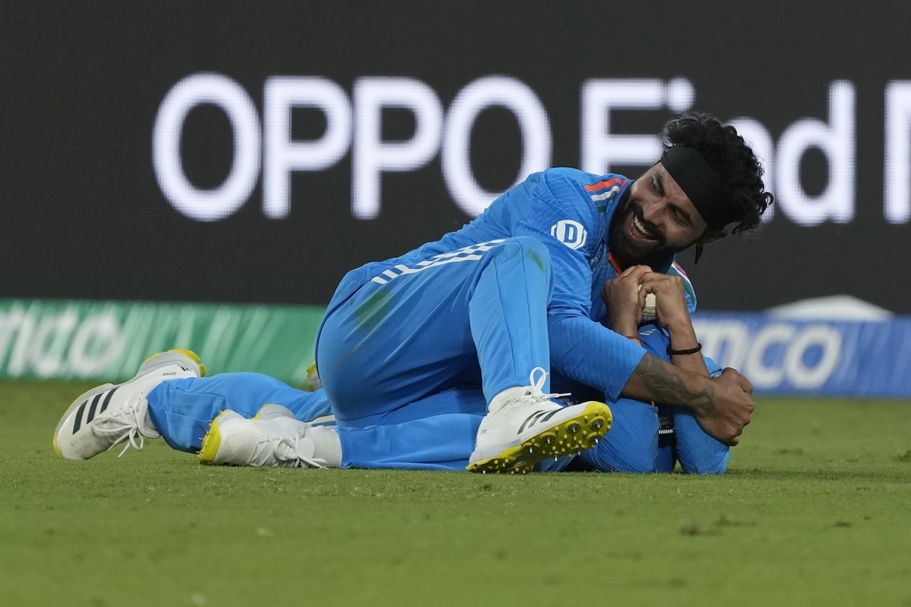 Ravindra Jadeja hugs Kuldeep Yadav after the latter pulled off a tumbling catch, India vs Afghanistan, ODI World Cup, Delhi, October 11, 2023
