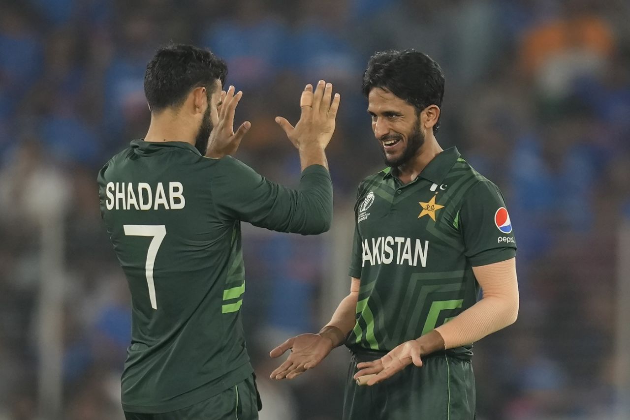 Hasan Ali and Shadab Khan celebrate the wicket of Virat Kohli, Ahmedabad, October 14, 2023