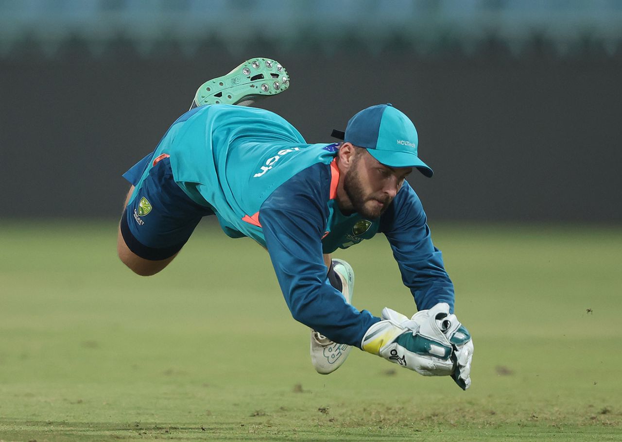 Josh Inglis dives for a catch during training, Lucknow, October 14, 2023