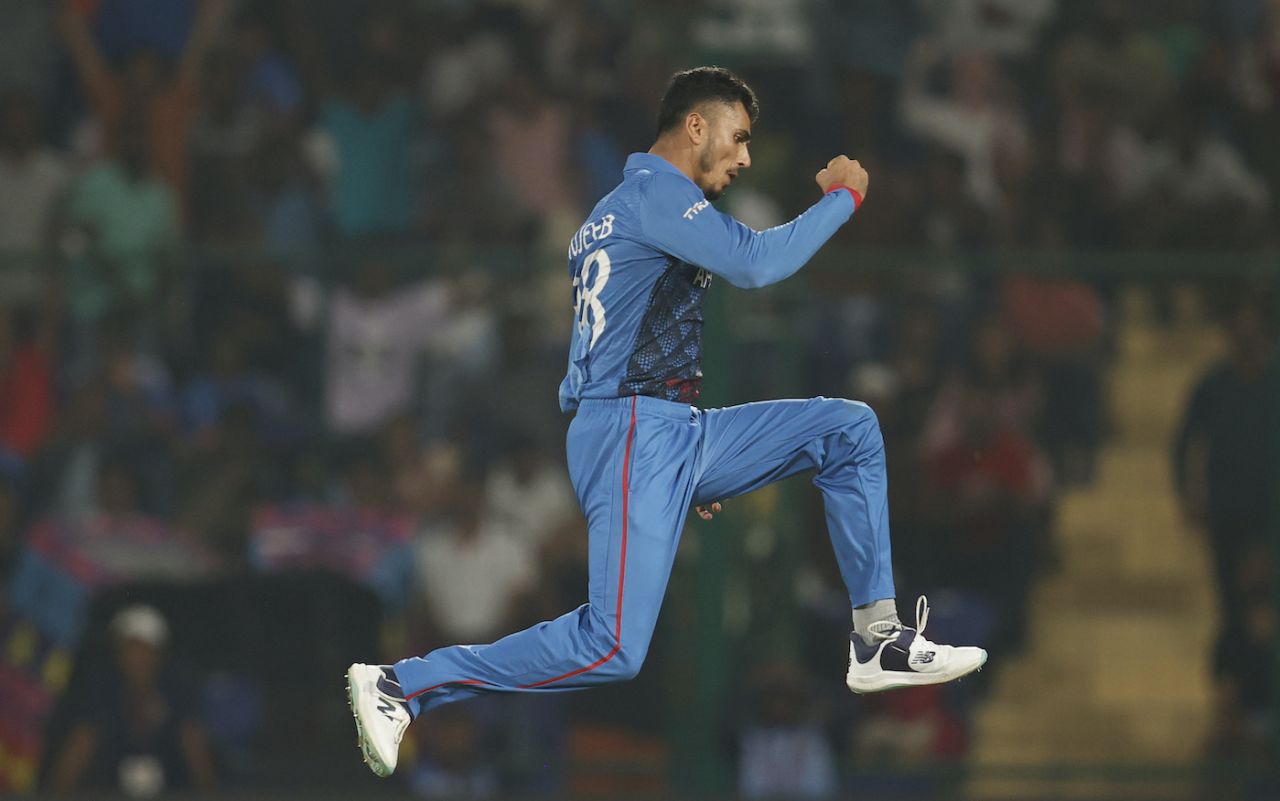 Hard to expect Mujeeb Ur Rahman keeping his feet on the ground after knocking over Joe Root, England vs Afghanistan, Men's Cricket World Cup 2023, Delhi, October 15, 2023