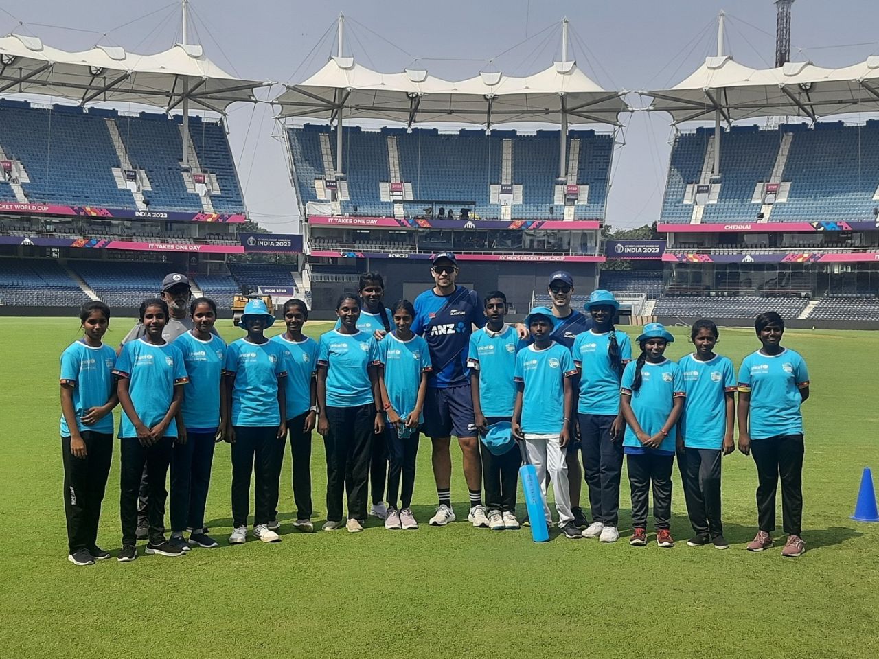 One for the album: Tim Southee and Mark Chapman pose with the kids, Chennai, October 15