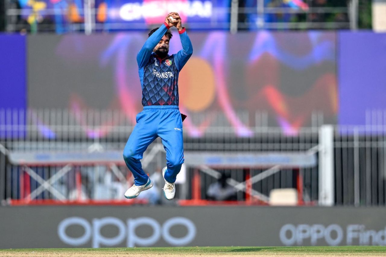 Rashid Khan engages in plyometrics while fielding the ball, New Zealand vs Afghanistan, Men's ODI World Cup, Chennai, October 18, 2023