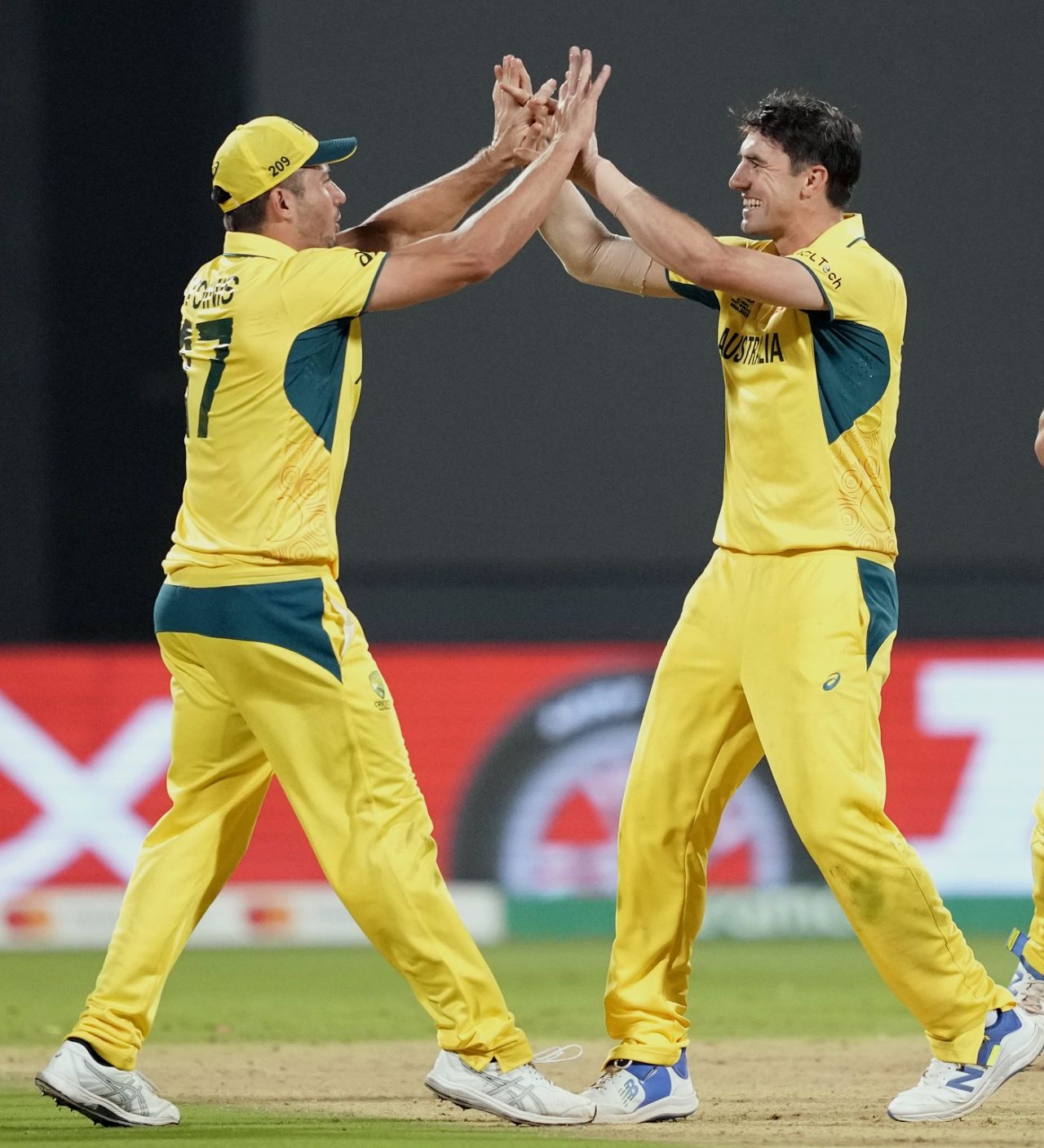 Marcus Stoinis and Pat Cummins celebrate Saud Shakeel's wicket, Australia vs Pakistan, Men's World Cup 2023, Bengaluru, October 20, 2023