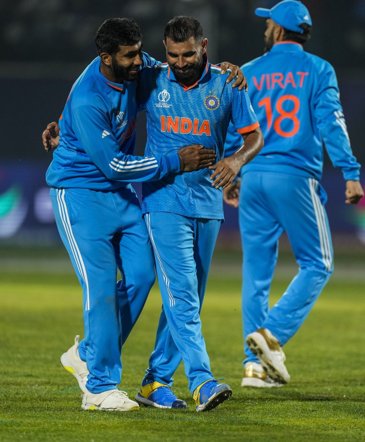 Mohammed Shami and Jasprit Bumrah celebrate Daryl Mitchell's wicket, India vs New Zealand, Men's ODI World Cup, Dharamsala, October 22, 2023