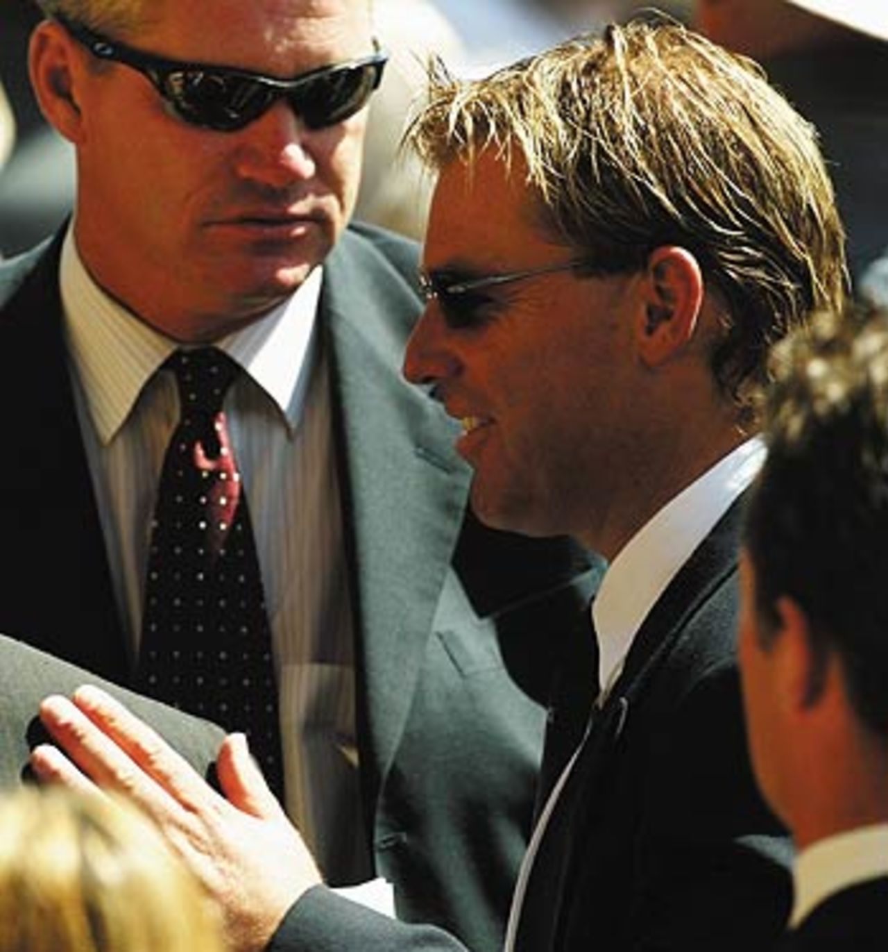 Shane Warne and Dean Jones arrive to pay their tributes, Adelaide, January 27, 2004