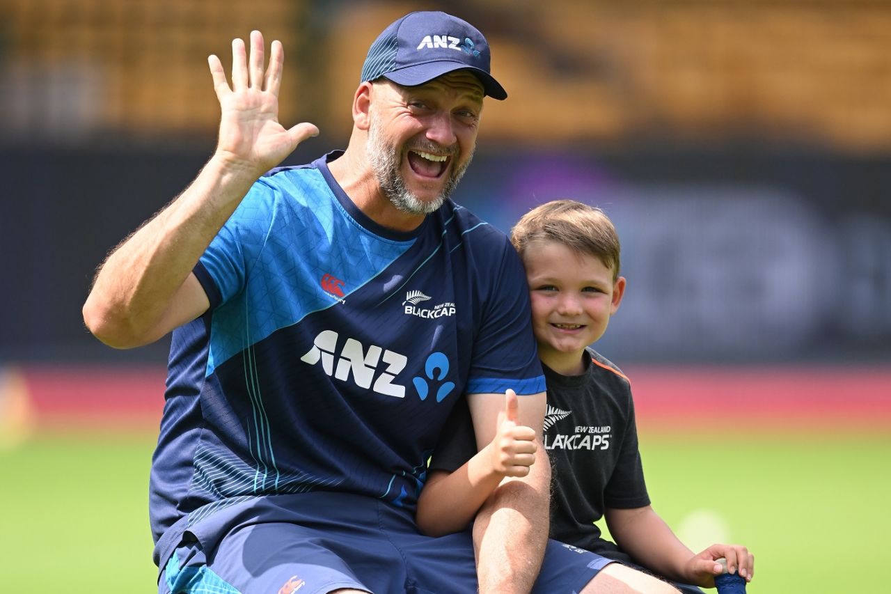New Zealand bowling coach Shane Jurgensen with his son Remy at a training session, Bengaluru, November 8, 2023