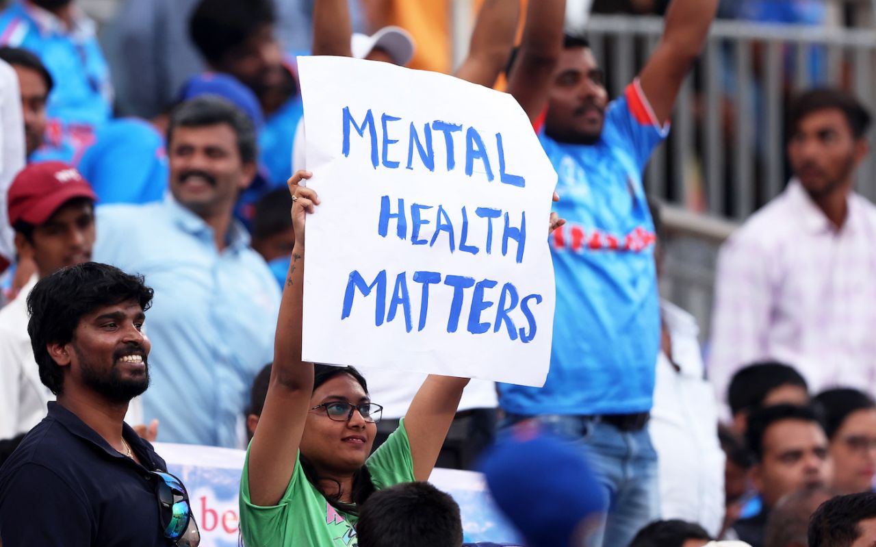 A fan holds a placard in support of mental health, Australia vs Bangladesh, Men's ODI World Cup, Pune, November 11, 2023