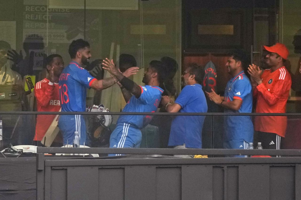 Virat Kohli walks back to an ecstatic group of team-mates, India vs New Zealand, ICC men's World Cup 2023, 1st semi-final, Mumbai, November 15, 2023