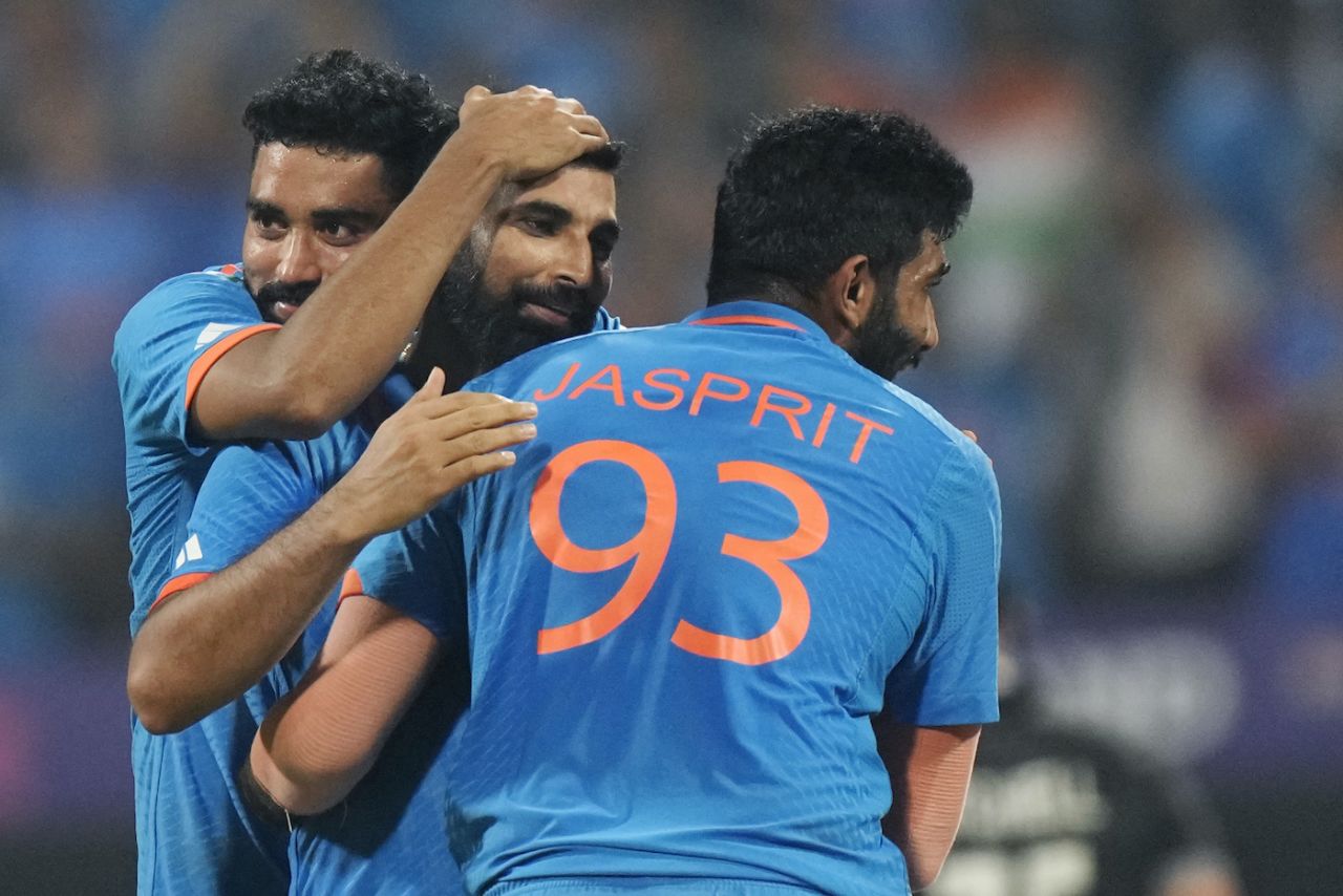 Mohammed Siraj and Jasprit Bumrah celebrate with Mohammed Shami, India vs New Zealand, ICC Men's World Cup 2023, 1st semi-final, Mumbai, November 15, 2023