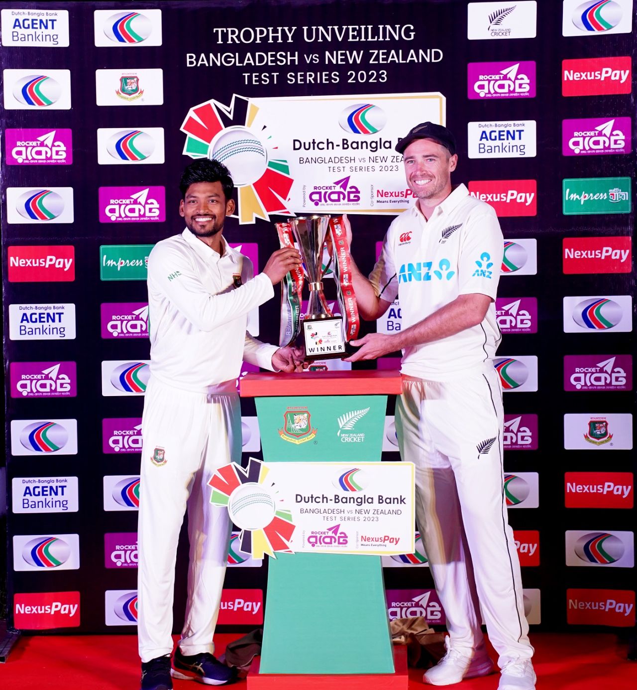 Najmul Hossain Shanto and Tim Southee pose with the trophy, Sylhet, November 27, 2023