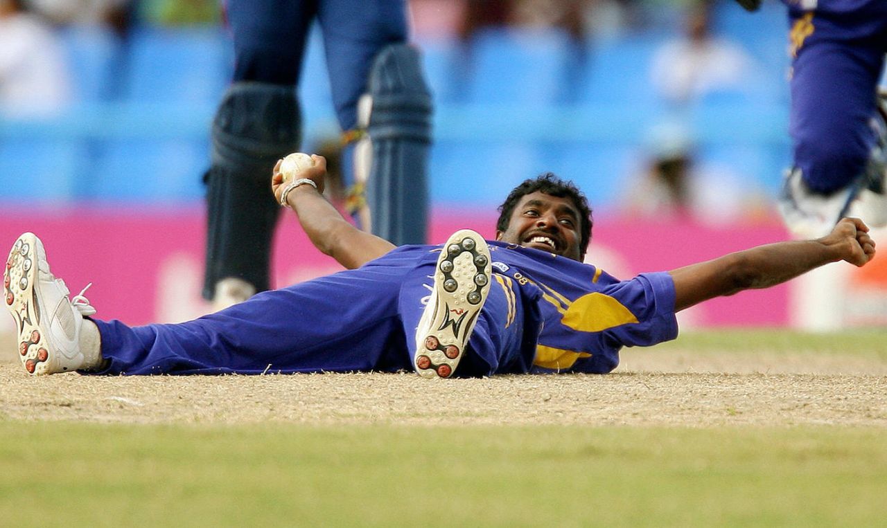Muttiah Muralitharan lies flat on his back after catching Kevin Pietersen, England v Sri Lanka, Super Eights, Antigua, April 4, 2007