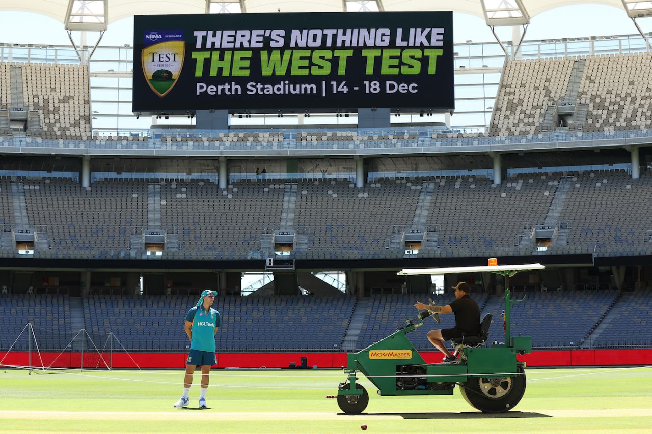 Pat Cummins talks with head curator Isaac McDonald during an Australia nets session, Australia vs Pakistan, 1st Test, Perth, December 12, 2023