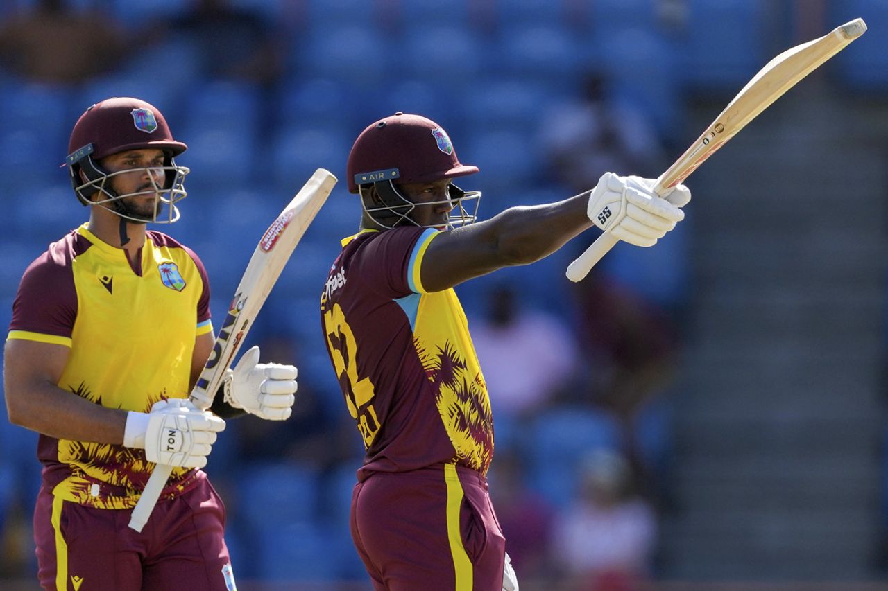 Rovman Powell raises his bat on reaching fifty, West Indies vs England, 2nd T20I, Grenada, December 14, 2023