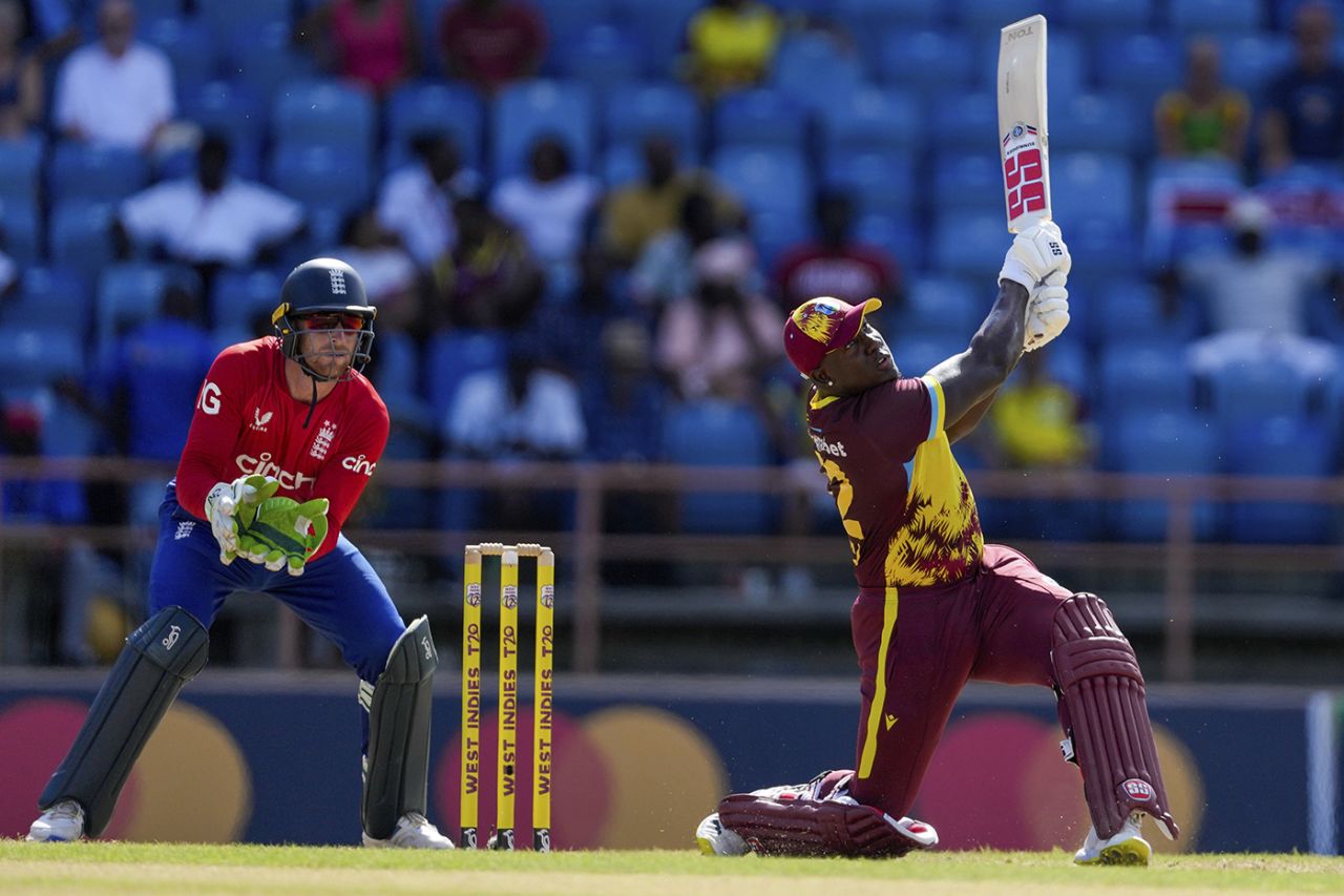 Rovman Powell launches one during his 39 off 21, West Indies vs England, 3rd T20I, Grenada, December 16, 2023