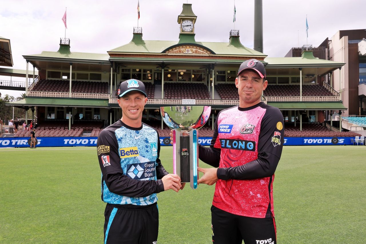 Nathan McSweeney and Moises Henriques pose with the BBL trophy ahead of the final, BBL 2023-24, Sydney, January 23, 2024