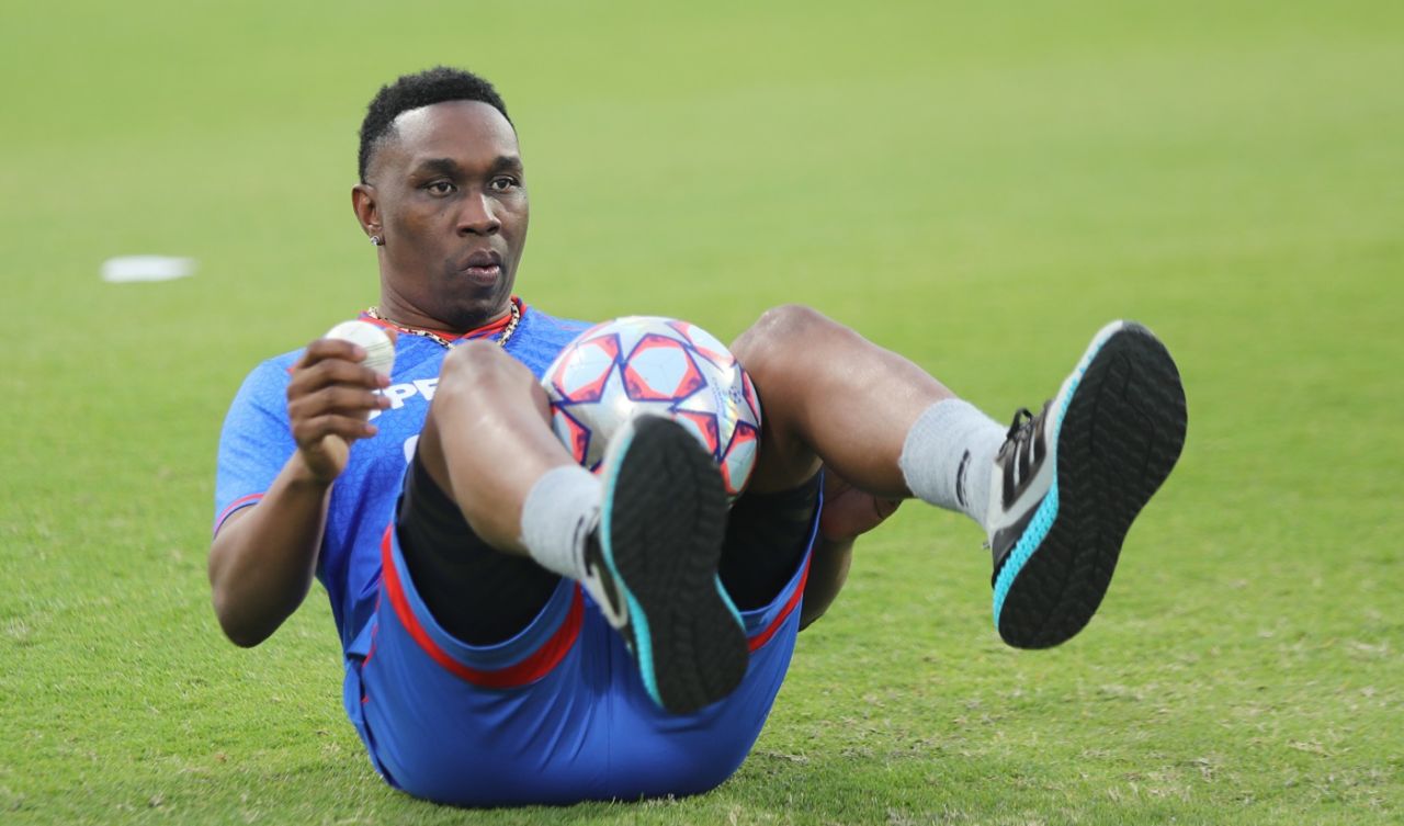 Dwayne Bravo warms up, Sharjah Warriors vs MI Emirates, ILT20 2024, Sharjah, January 26, 2024
