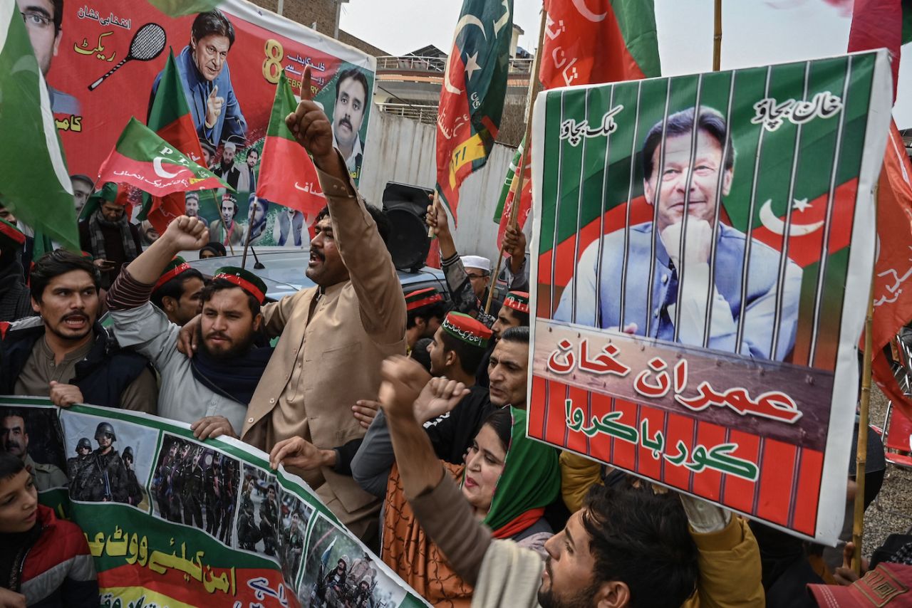 Supporters of Imran Khan's political party, Tehreek-e-Insaf, shout slogans during a protest, Peshawar, January 28, 2024