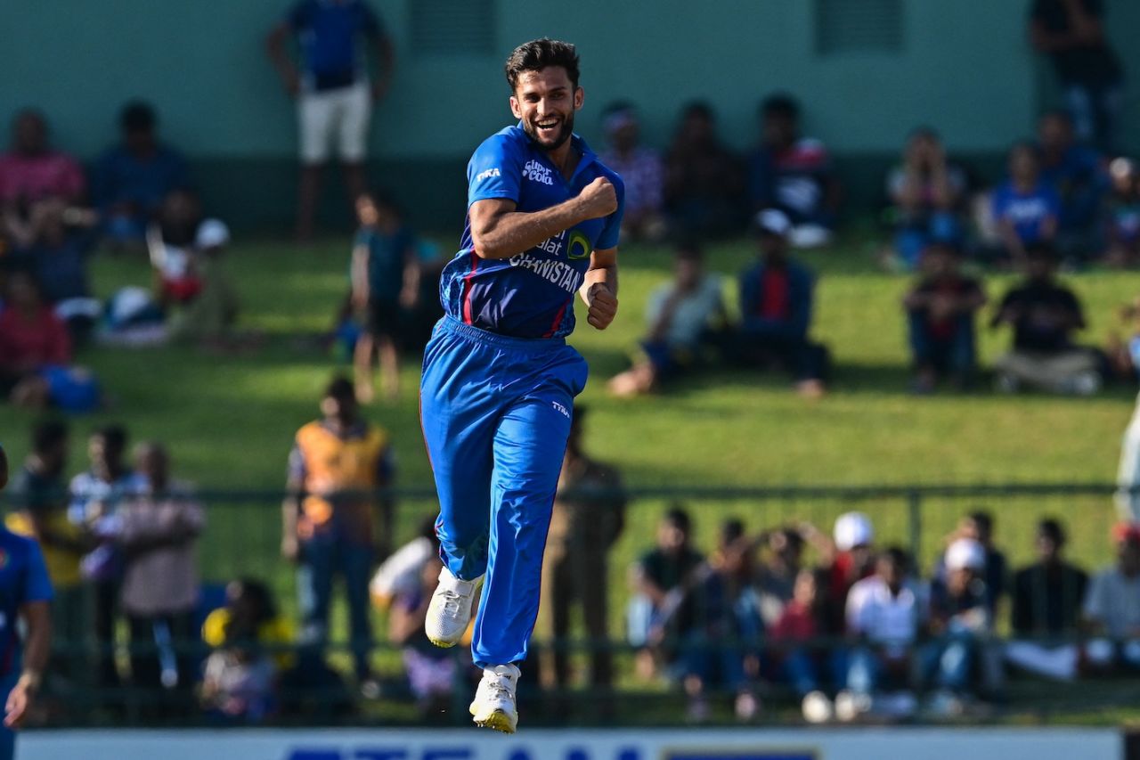 Australia argue with umpire Gerard Abood after a run out was given not
