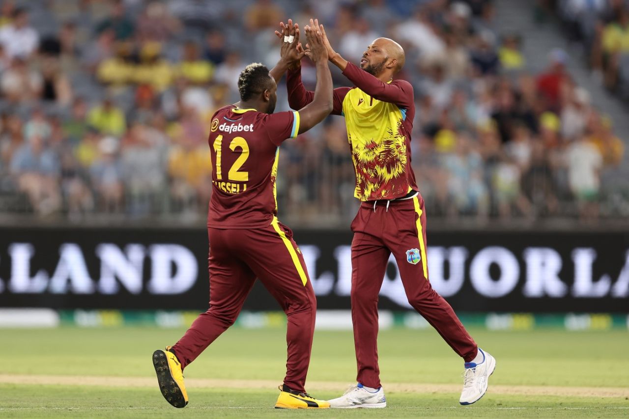 Roston Chase and Andre Russell celebrate a wicket, Australia vs West Indies, 3rd T20I, Perth, February 13, 2024